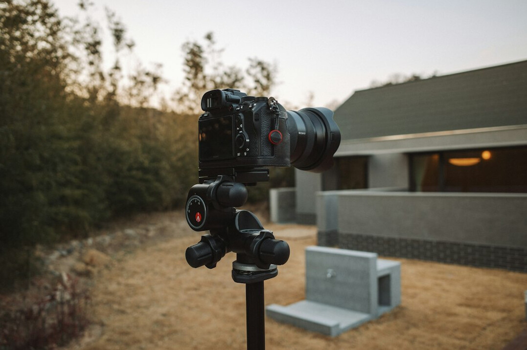 Camera mounted on a tripod ready for filming