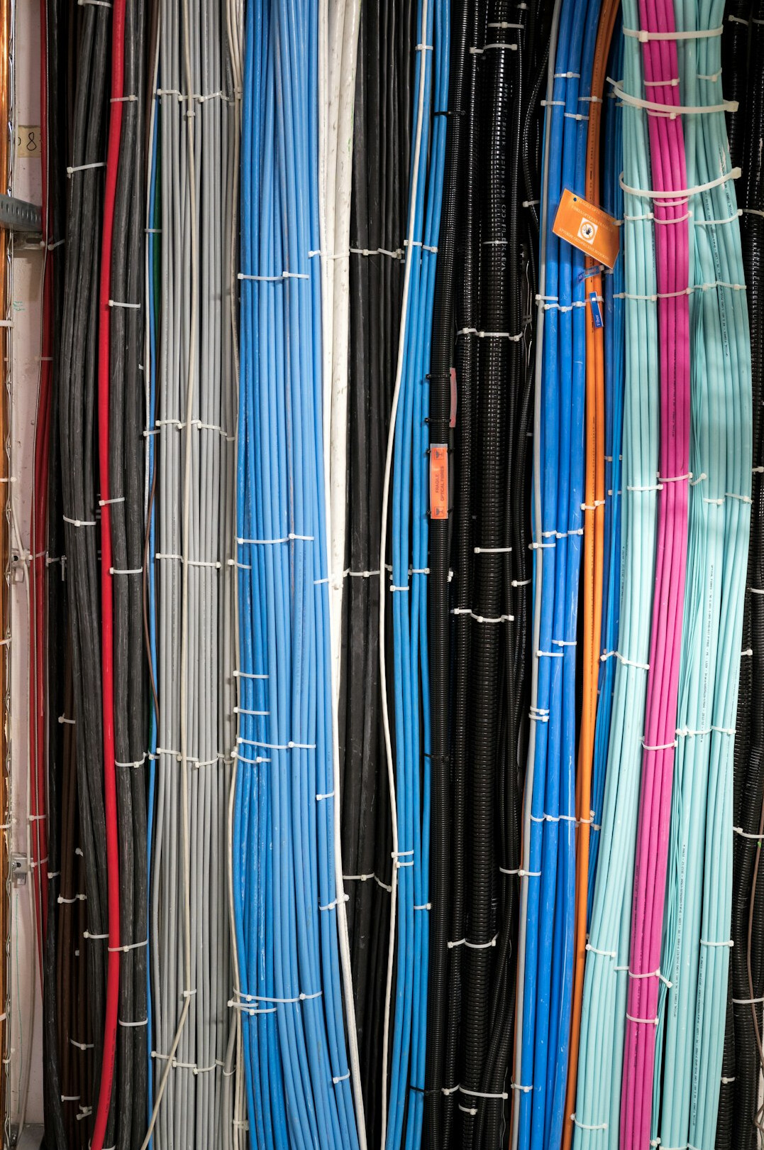 Server racks with network cables in a data room